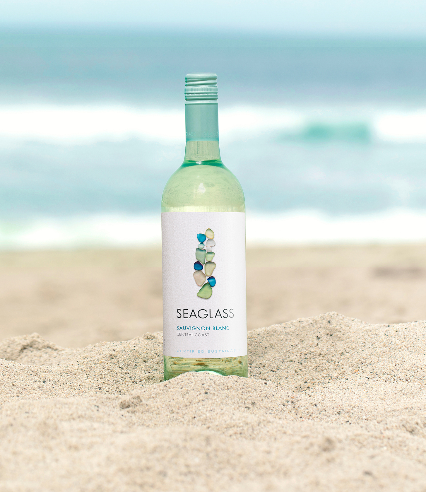 SEAGLASS Sauvignon Blanc bottle in sand